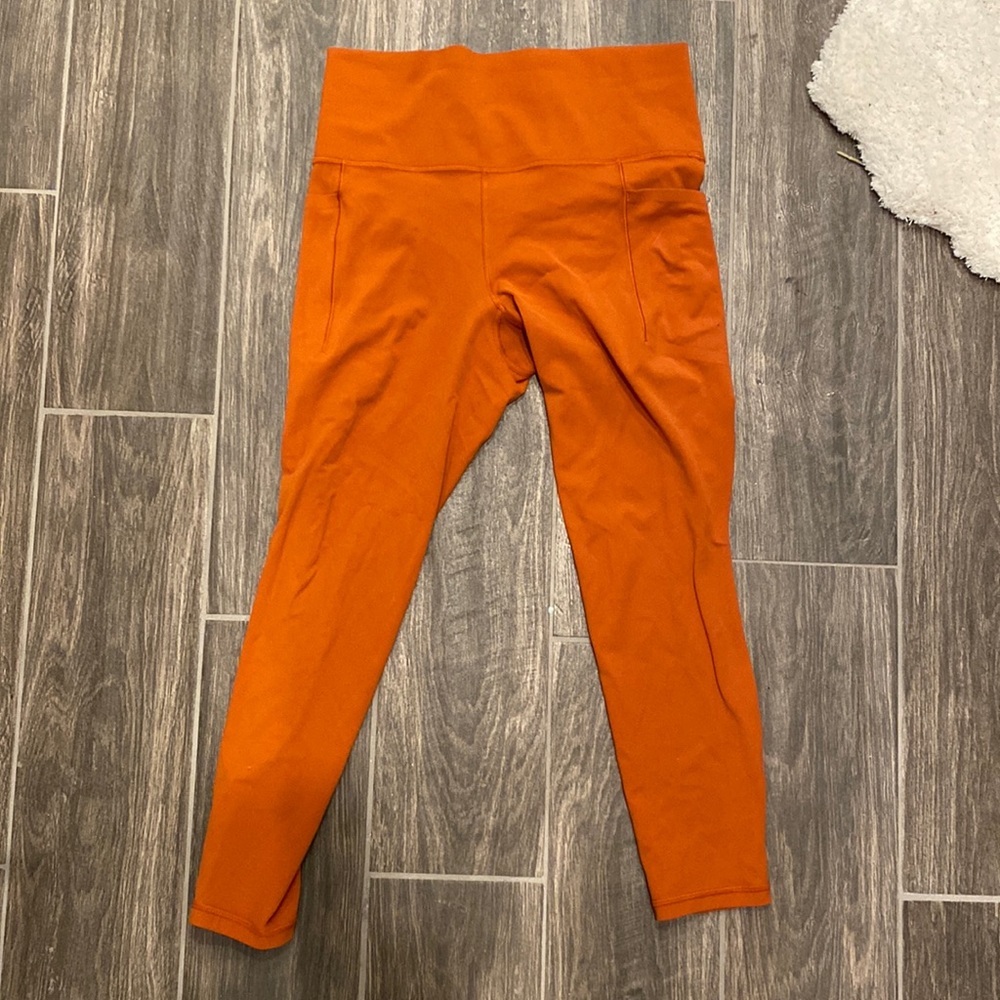 Athleta Salutation Stash Pocket 7/8 Tight